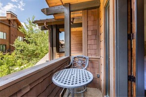 The guest suite also features a private balcony with a table and chairs to enjoy a cup of coffee while watching the sunrise. - Juniper Landing (Park City)