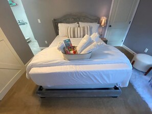 Restful retreat with a comfortable bed, bedside table, and convenient storage for essentials.