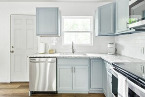 Microwave, stovetop, dishwasher, coffee/tea maker