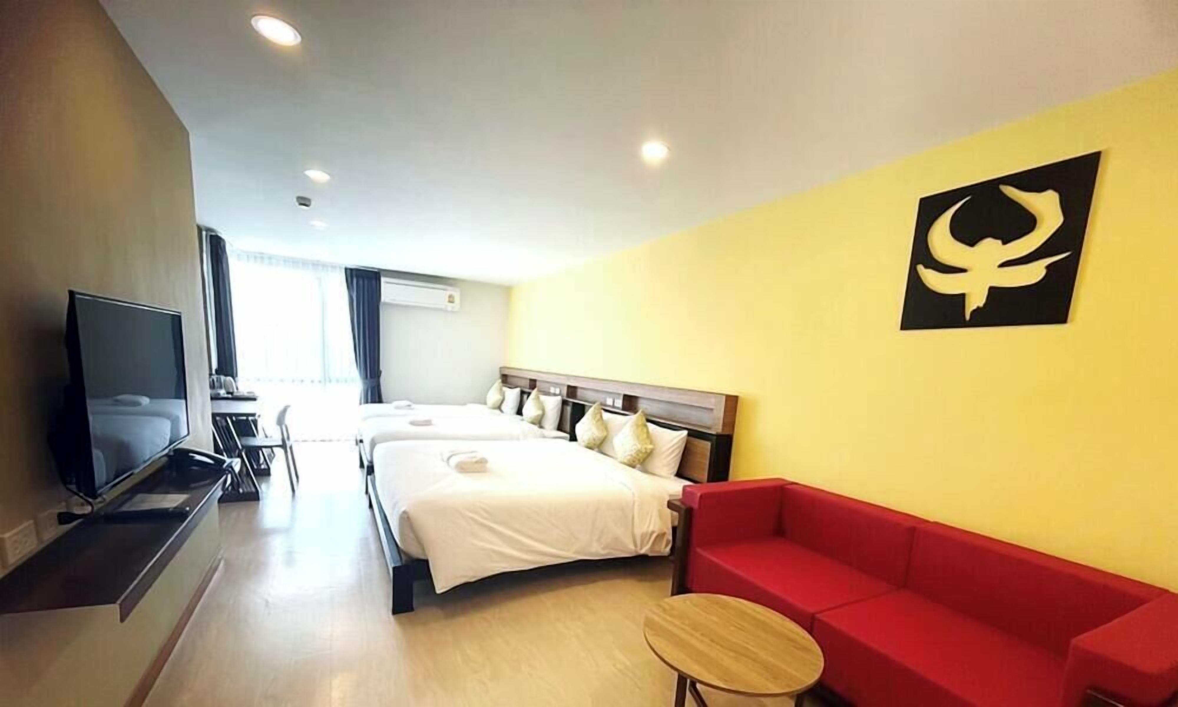 Family Room with Balcony | Pillow-top beds, free WiFi, bed sheets