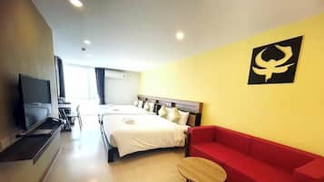 Family Room with Balcony | Pillow-top beds, free WiFi, bed sheets
