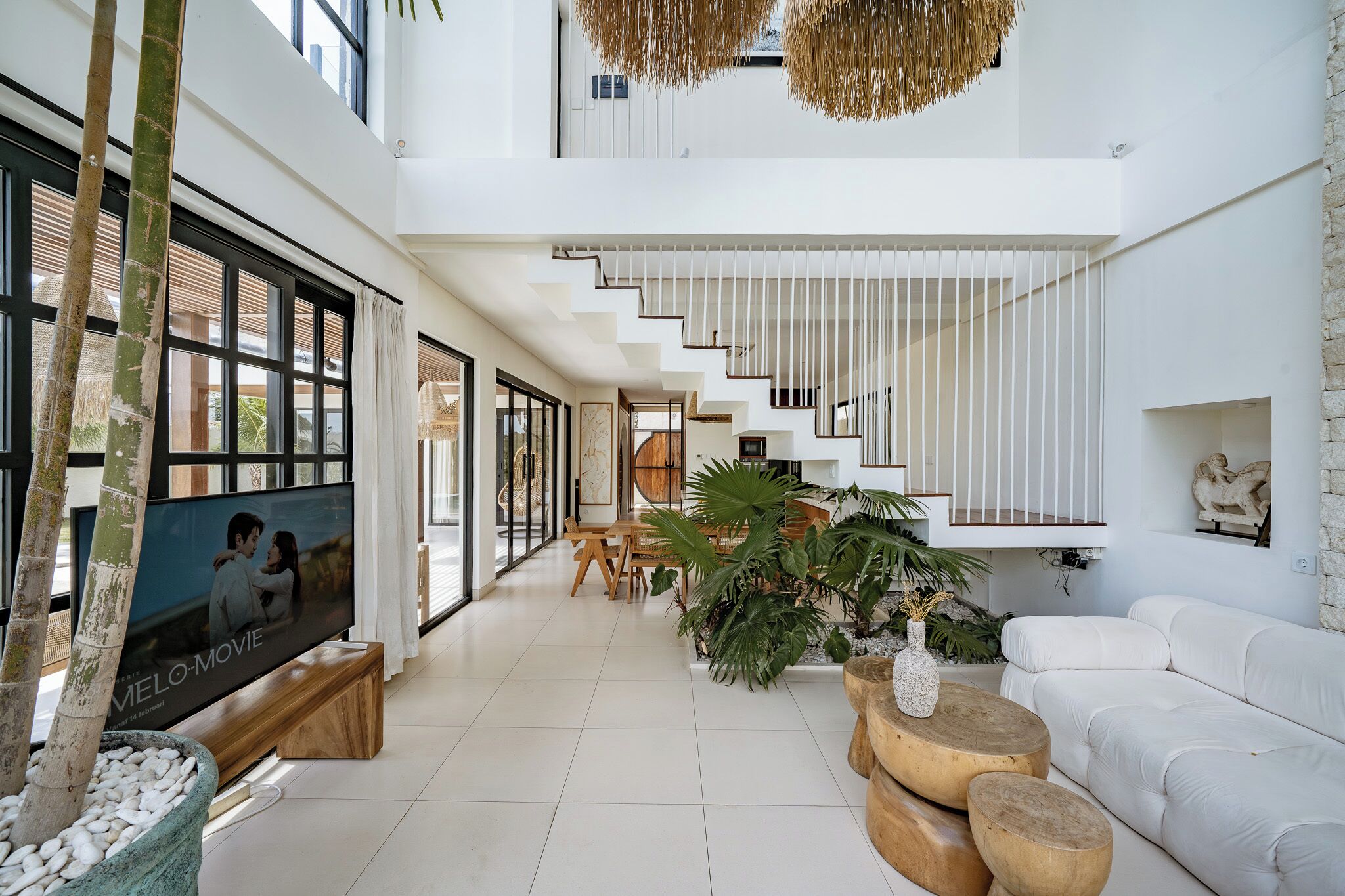 Villa | Living area | 55-inch TV with cable channels