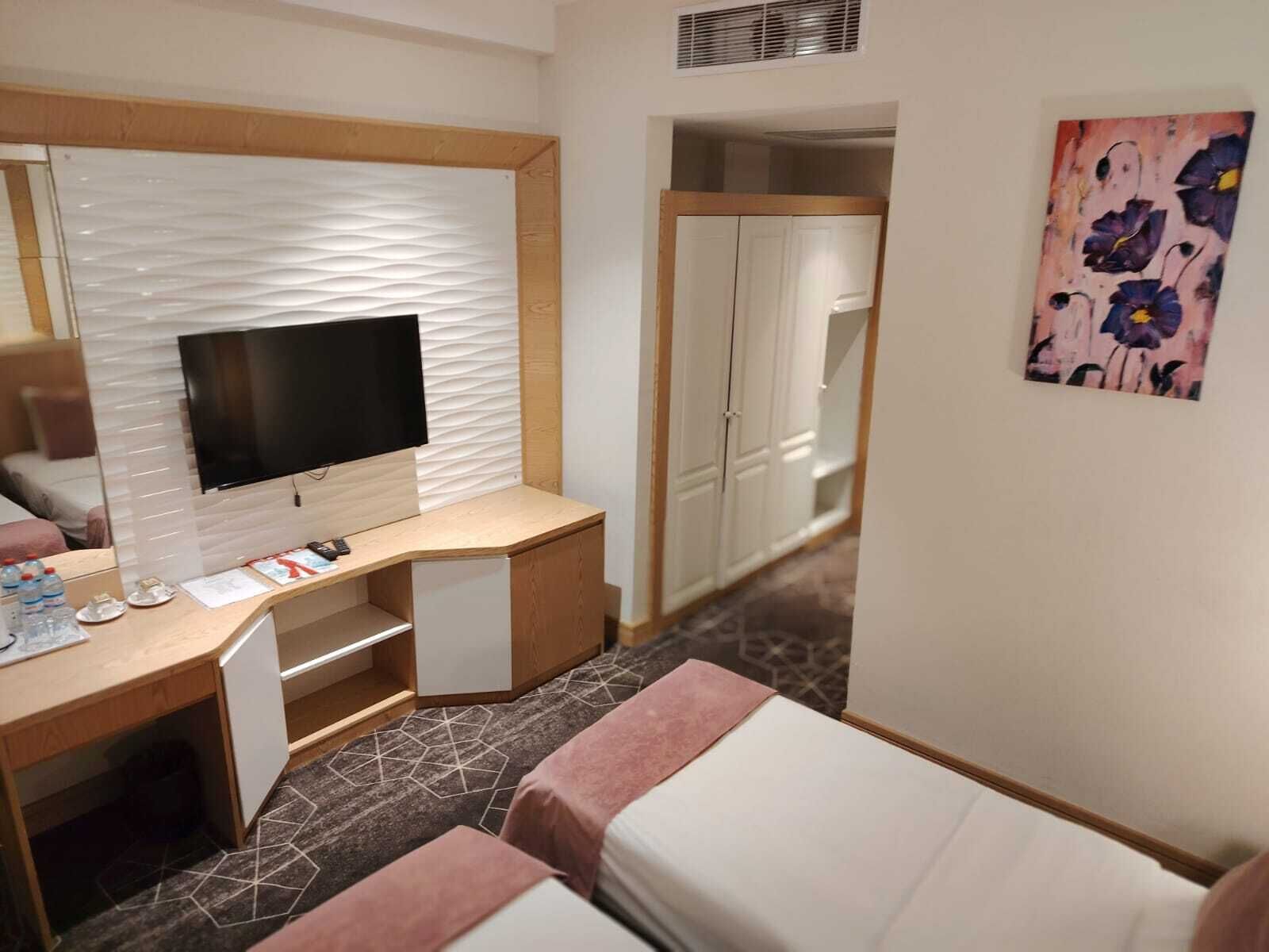 Standard Twin Room | Minibar, in-room safe, soundproofing, iron/ironing board