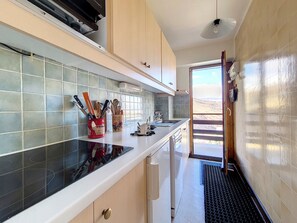 Fridge, microwave, dishwasher, coffee/tea maker