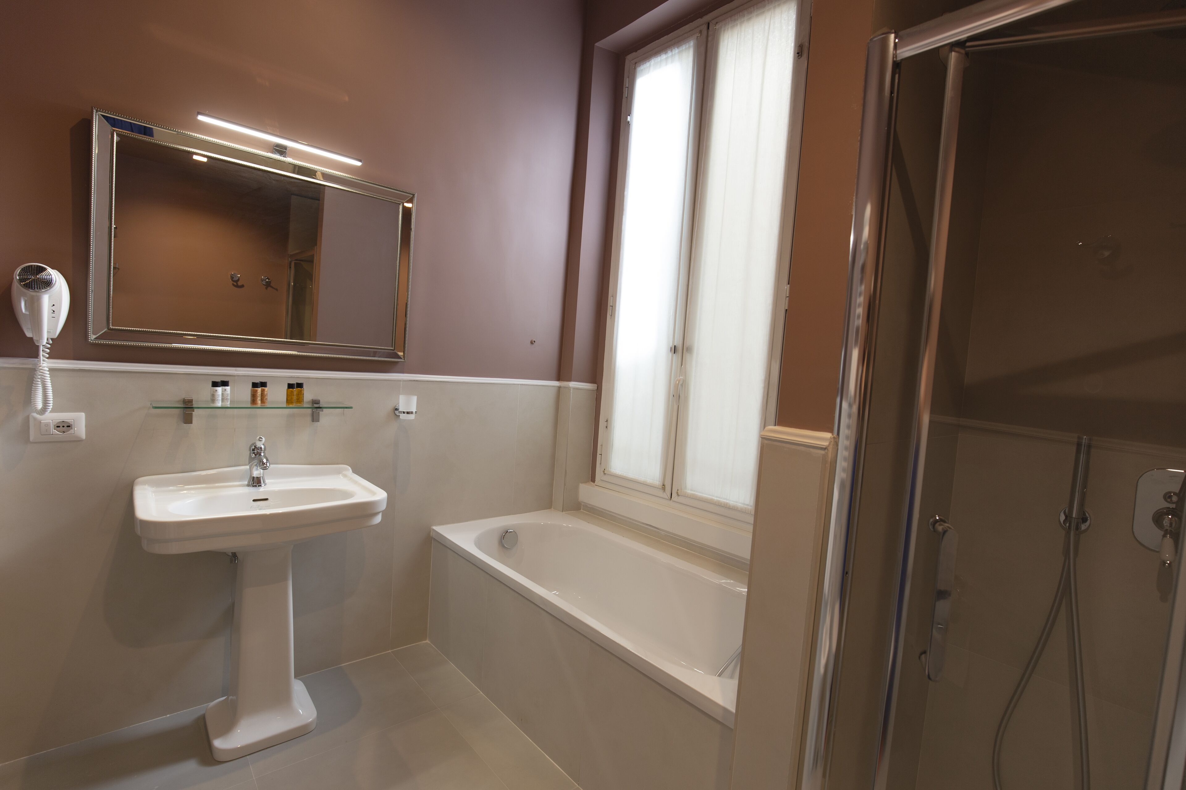 shower, free toiletries, hair dryer, slippers