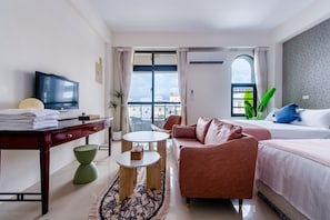 Deluxe Quadruple Room, Balcony | Free WiFi, bed sheets
