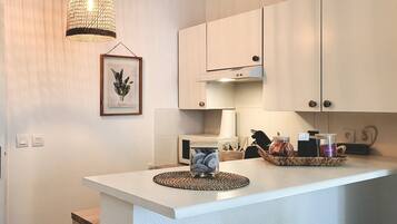 Fridge, microwave, coffee/tea maker, electric kettle