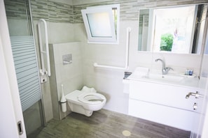 Premium Triple Room, Patio | Bathroom | Shower, towels