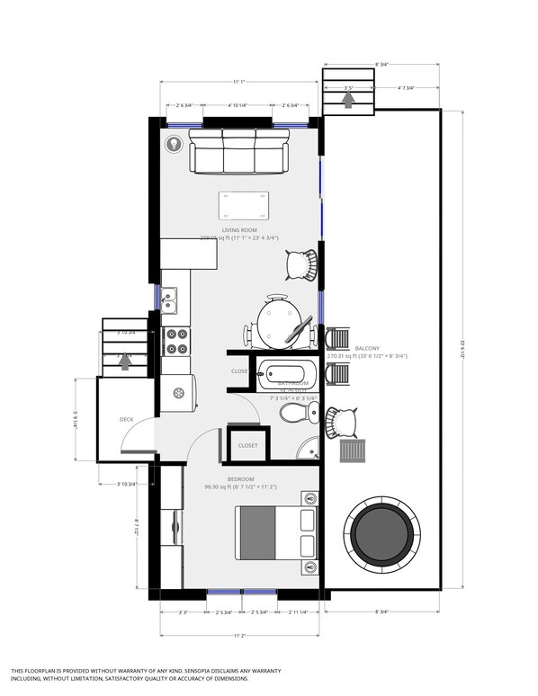 A floor plan of a house with a living room, deck, balcony, and bedroom.
