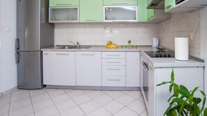 Leilighet (Three Bedroom Apartment with Terrace) | Eget kjøkken | Kjøleskap