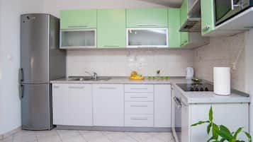 Apartment (Three Bedroom Apartment with Terrace) | Private kitchen | Fridge