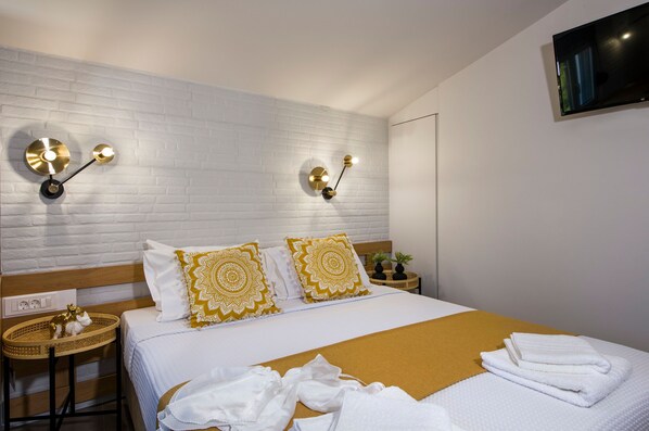 2 dormitorios, escritorio, tabla de planchar con plancha y wifi gratis