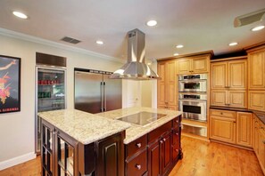 Fridge, coffee/tea maker, cookware/dishes/utensils