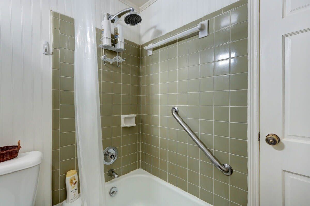 Bathtub, hair dryer, towels