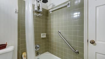 Bathtub, hair dryer, towels