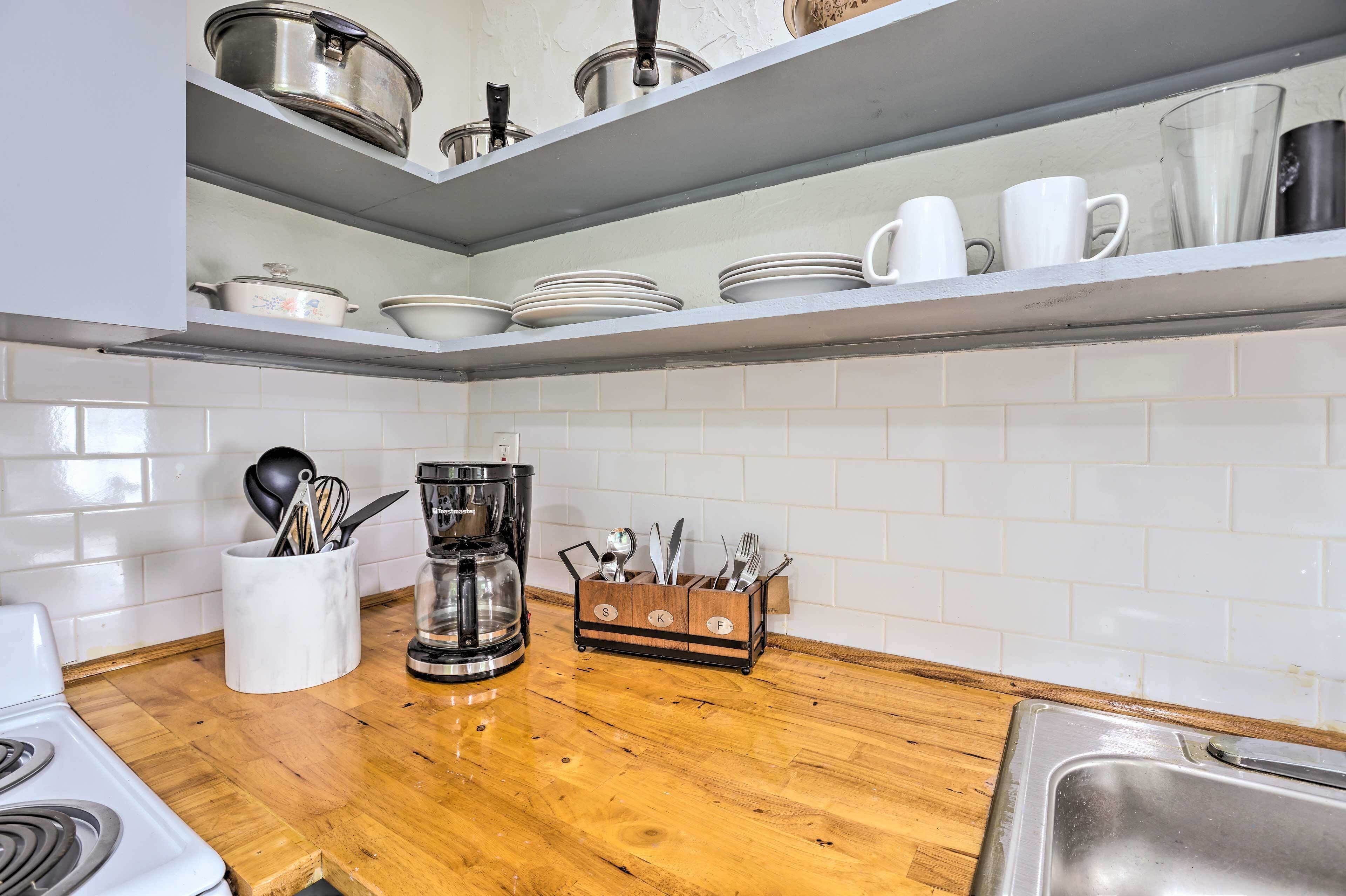 Fridge, stovetop, coffee/tea maker, cookware/dishes/utensils