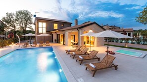 A heated pool - Modern Villa Curitico with pool, jacuzzi and sauna (Kadumi)