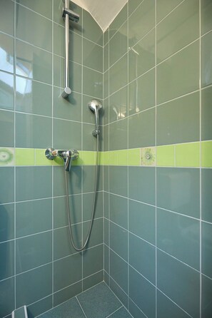 Bathtub, hair dryer, towels