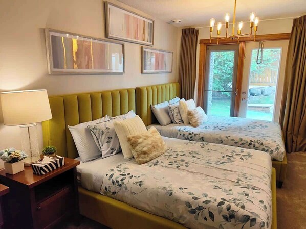 2 bedrooms, memory-foam beds, iron/ironing board, travel cot