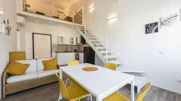 Comfort Apartment | Living area | TV