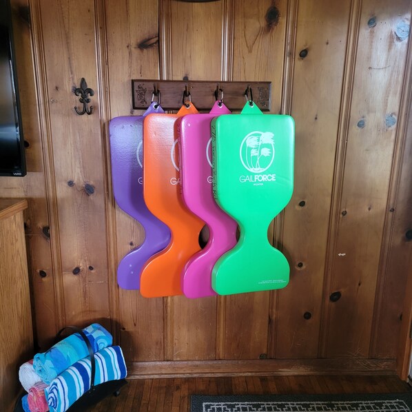 A wooden wall with a wooden cabinet and a green object hanging on it. - Dog Friendly and Beautiful Main Channel View at the 34.5MM in a "NO WAKE" cove.. (Sunrise Beach)