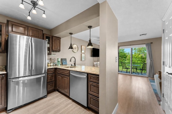 Coffee/tea maker, fridge, microwave, oven