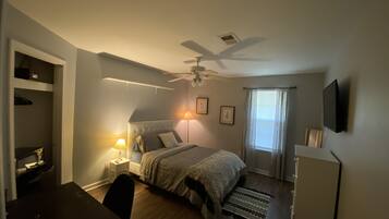 Grey Sunset Room | Premium bedding, down comforters, laptop workspace, iron/ironing board
