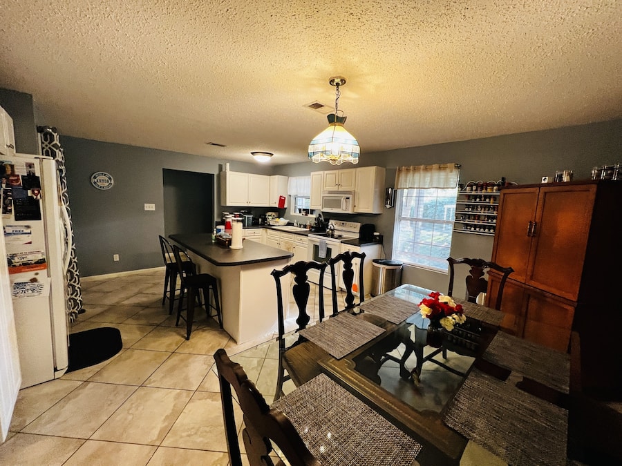 Mini-fridge, microwave, oven, stovetop