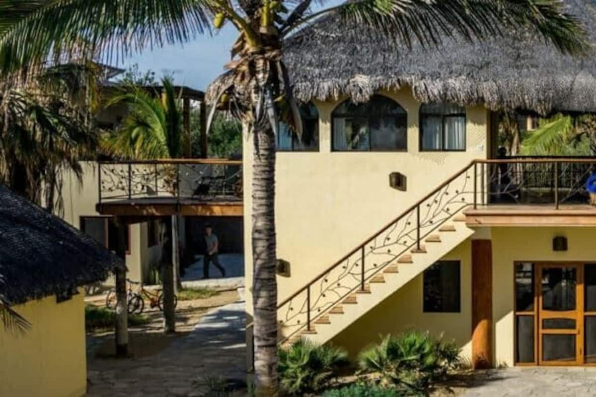 Deluxe Room, 1 Bedroom, Terrace, Beach View | In-room safe, blackout drapes, free WiFi, bed sheets