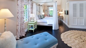 A bedroom with a bed, bedside tables, a ceiling fan, and a large window with curtains. - Leamington House - Five Bedroom Villa, Sleeps 10 (Little Battaleys)