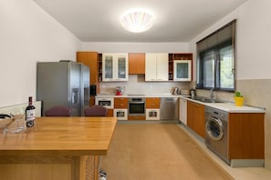 Dishwasher, high chair, dining tables
