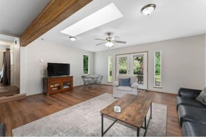 Smart TV, fireplace, foosball, books