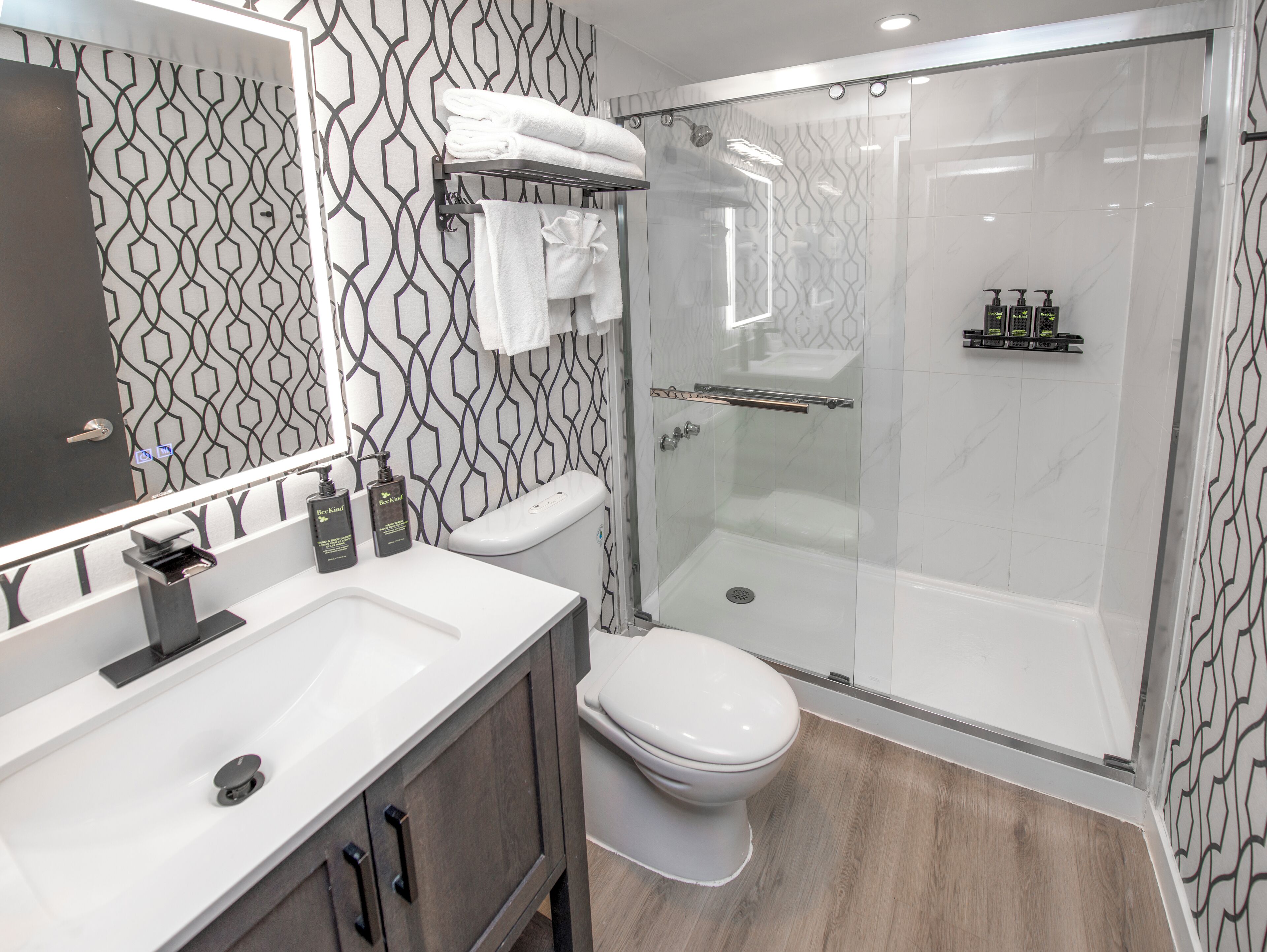 Designer toiletries, hair dryer, towels, soap