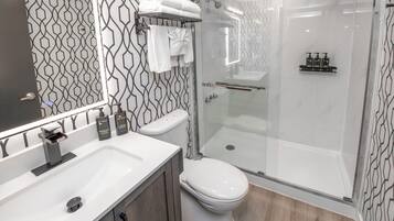 Designer toiletries, hair dryer, towels, soap