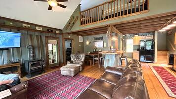 Smart TV, fireplace, foosball, books