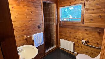 Combined shower/tub, hair dryer, towels, soap