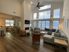 Main living area with floor to ceiling windows overlooking the Bay!