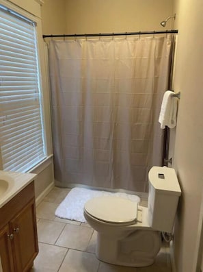 Combined shower/tub