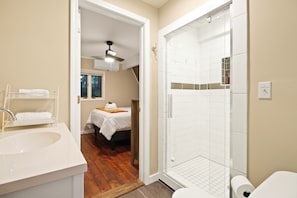 Shower, hair dryer, towels, soap