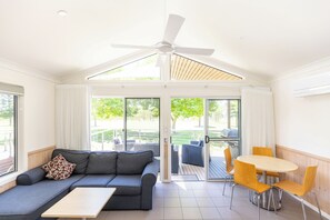 2 Bedroom Superior Cabin | Living area - NRMA Batemans Bay Holiday Park (Batehaven)
