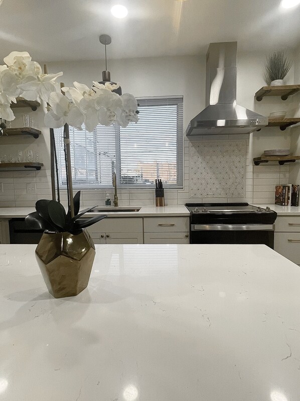 Fridge, microwave, oven, stovetop - The Franklinton Get Away | 3-Bdr Home Mins From Downtown Columbus (Columbus)