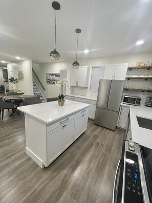 Fridge, microwave, oven, stovetop - The Franklinton Get Away | 3-Bdr Home Mins From Downtown Columbus (Columbus)