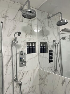 Combined shower/tub, hair dryer, towels, soap