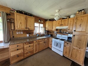 Fridge, oven, stovetop, coffee/tea maker - Cozy Cottage with Lake Leelanau access (Traverse City)