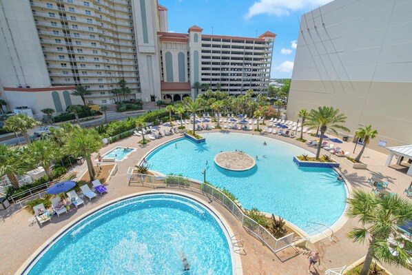 A heated pool - Beach Nest Escape - 5 Pools • Hot Tub • Gym • Wi-Fi (Panama City Beach)