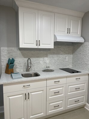 Fridge, microwave, coffee/tea maker, toaster