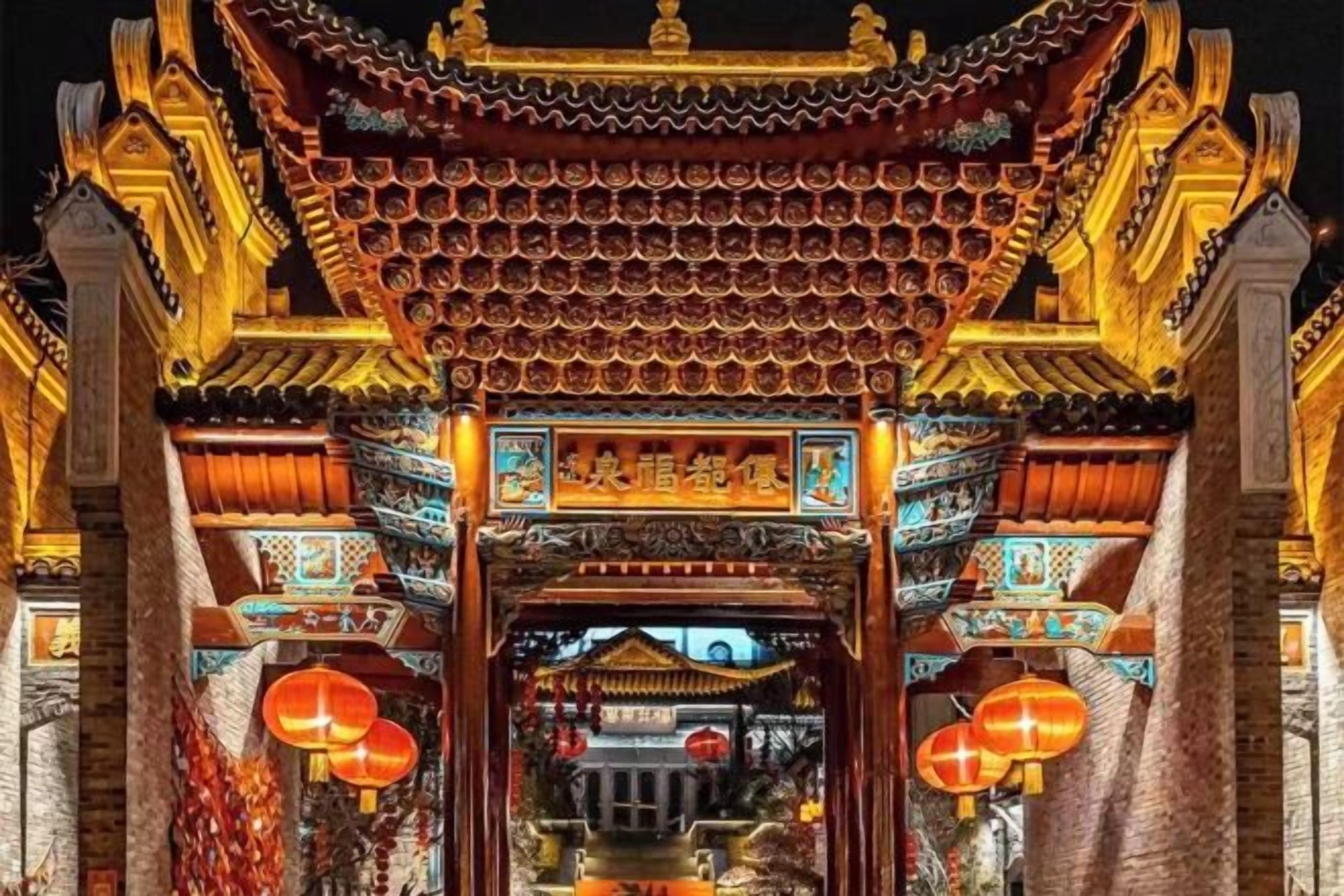 A traditional Chinese building with ornate architecture, including a tiled roof and decorative elements.