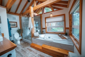 Bathtub, hair dryer, towels, soap