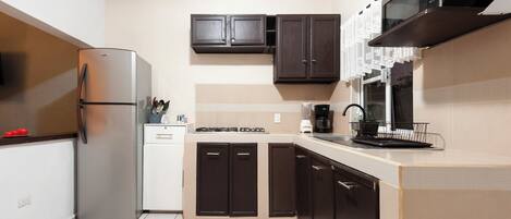 Microwave, stovetop, coffee/tea maker, blender