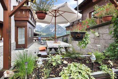 Apartment 'Casa Grafa Bormio' with Mountain View, Shared Garden & Wi-Fi